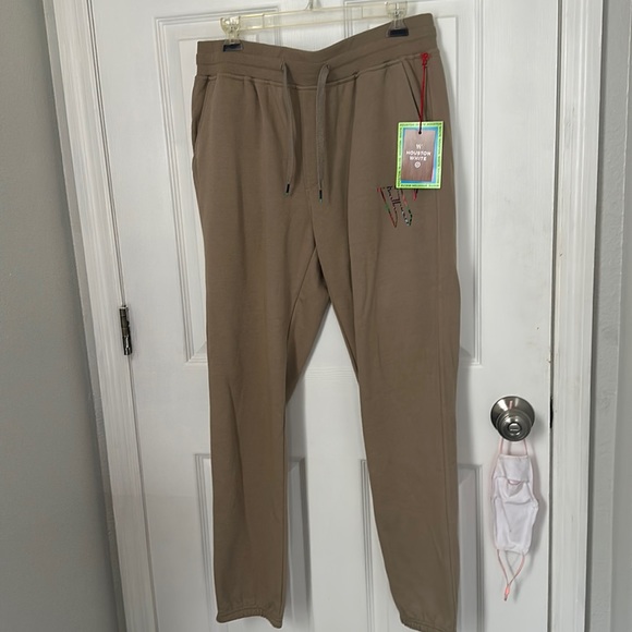 New Sweatpants. Drawstring front. Letter W looks a bit washed off . - Picture 1 of 3